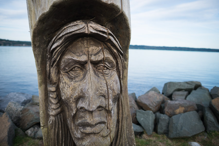 &hellip;mirrored by a weathered carving of an old man&rsquo;s face in a tree moved far from its original roots.