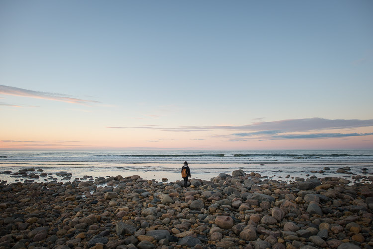 Silhouetted against a beautiful northern sunset. There&rsquo;s something that draws us to the water wherever we find ourselves at sunset, even this far north.