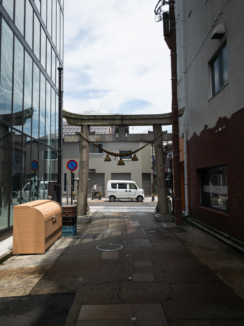 This stone gate is known as a torii and it is a powerful symbol repeated throughout Japan. It marks the transition from the mundane to the sacred and serves as a reminder that one is treading on ground with deep spiritual meaning - even in the heart of the city where the earth has been covered in pavement.