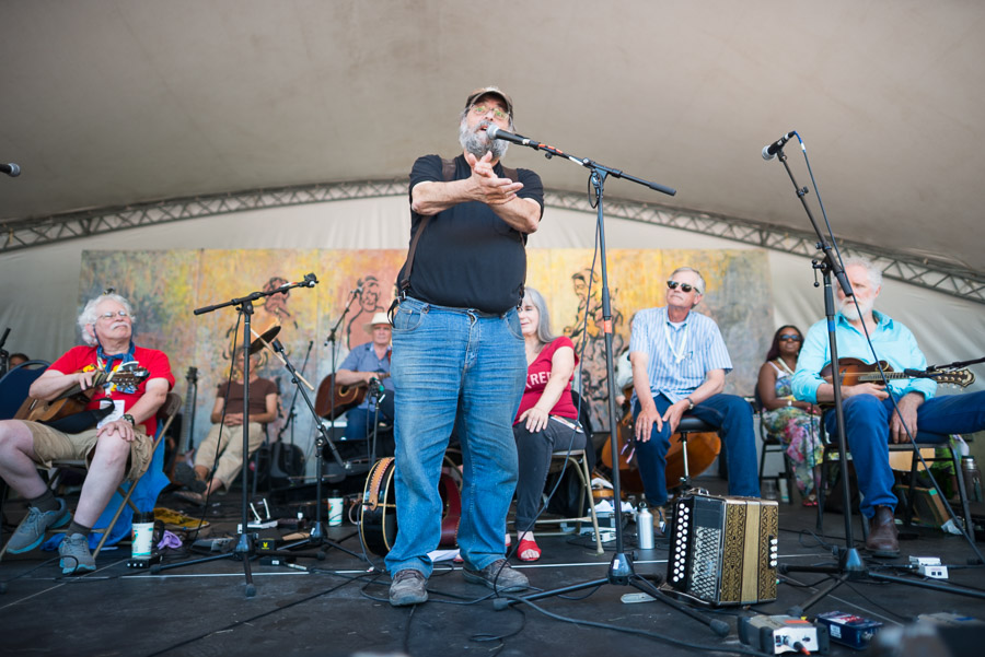 Mitch Podolak, one of the original founders of the Winnipeg Folk Festival, gets up to offer a few sentimental thoughts of reflection after a successful workshop.
