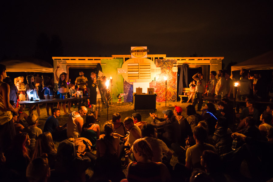 Crowds gather for a midnight game of Folk Fest Feud in the festival campground.