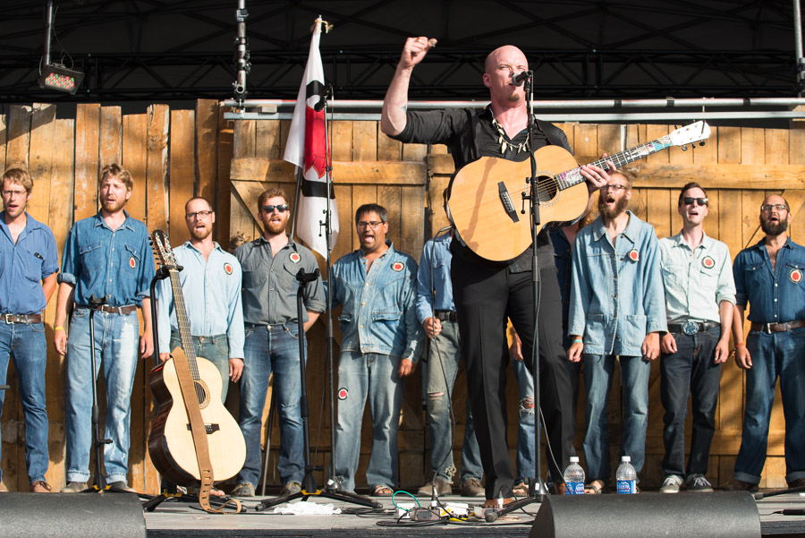 Nathan Rogers, son of the late Stan Rogers, performs his father’s timeless classic “Northwest Passage” with the Riel Gentleman’s Choir.