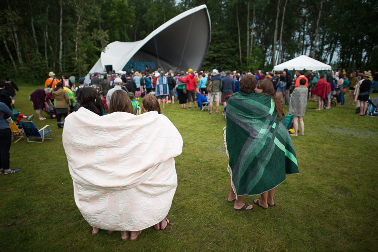 Blankets morphed from seats into cloaks.