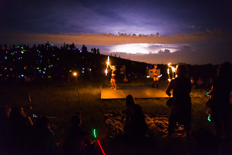 It has become a ritual of sorts that Saturday night is the time for fire dancers to work their magic at Pope&rsquo;s Hill. On this particular night, the sky echoed the fire dance with quiet lightning that flashed all night long.