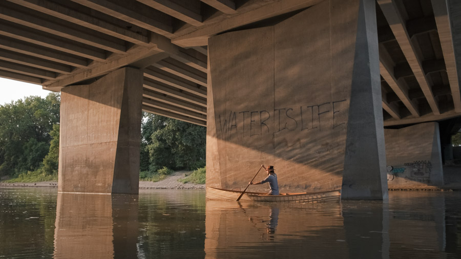 Rob Kokesch paddles a canoe built with his own hands under a bridge in Winnipeg.Context: From my work as Director of Photography and Editor for a short film titled ‘Meet Me on the River’ (released 2025), a poetic and layered exploration of seasonal transitions on both the natural and human scales. –link to video–